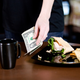 Illustration for article titled Should Restaurants Abolish Tipping?